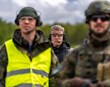 Afi var handtekinn vegna NATO, sonarsonurinn starfar fyrir NATO