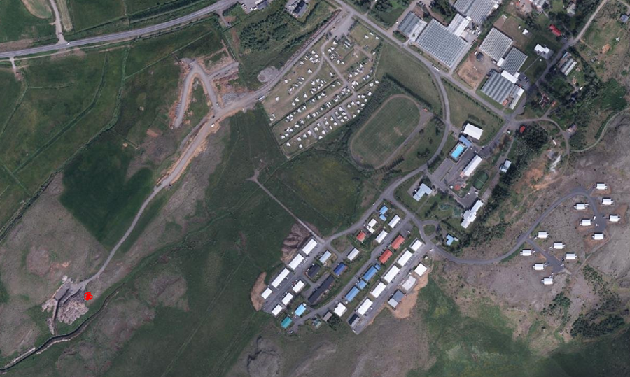 Staðsetning borholunnar í Reykholti er merkt á kortið með rauðum punkti.